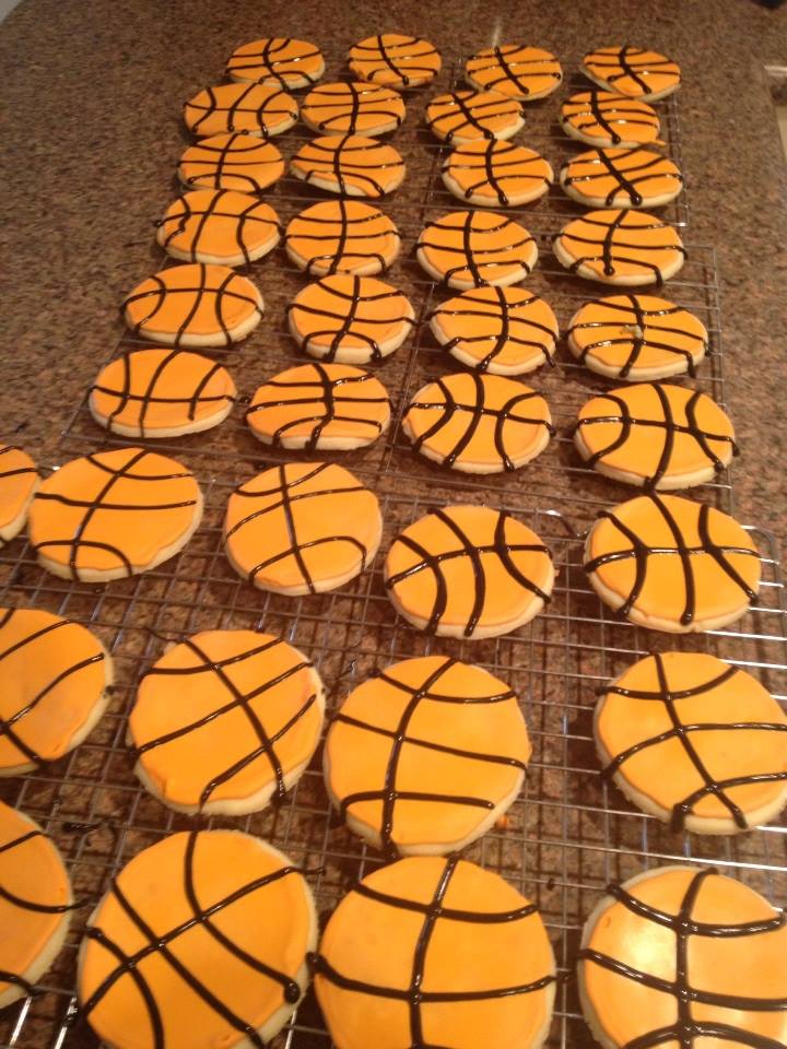 sugar cookies decorated like basketballs