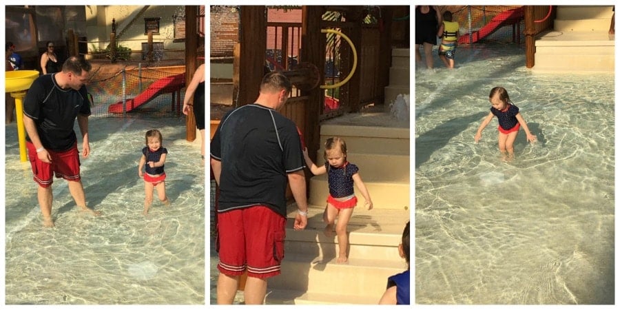 water park with dad and kid playing