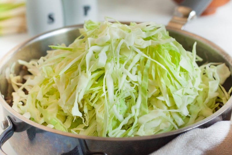 shredded cabbage in a skillet