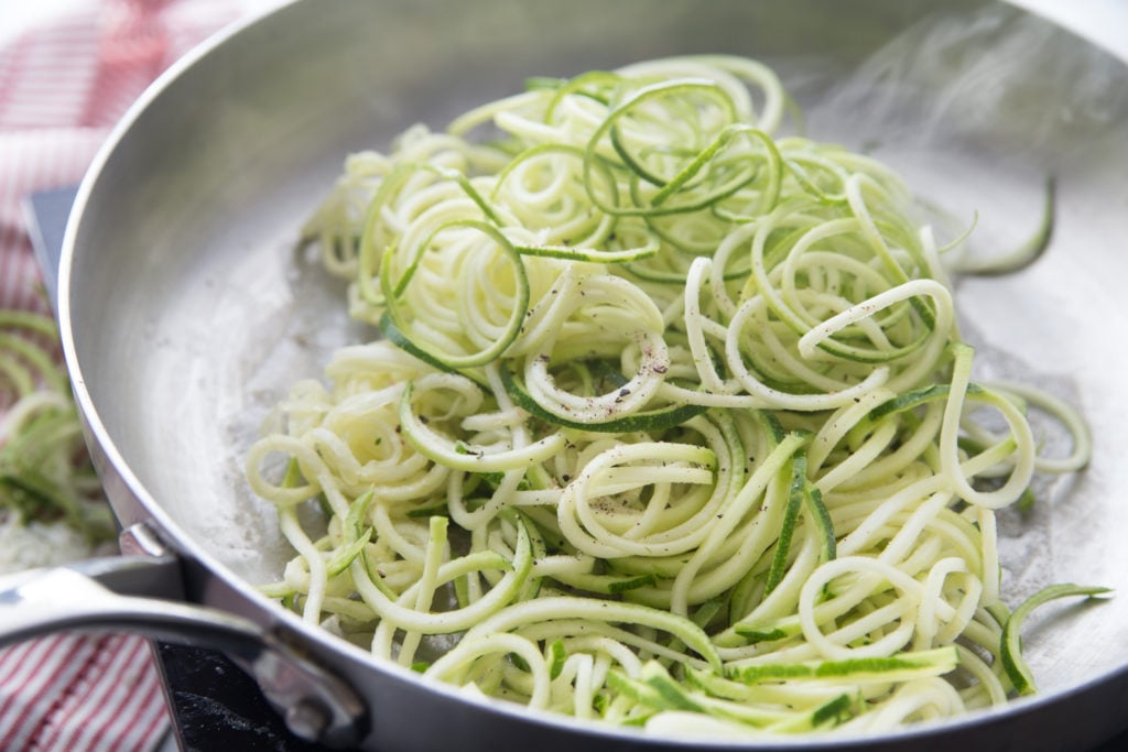 zucchini spiralized low carb noodles in a skillet