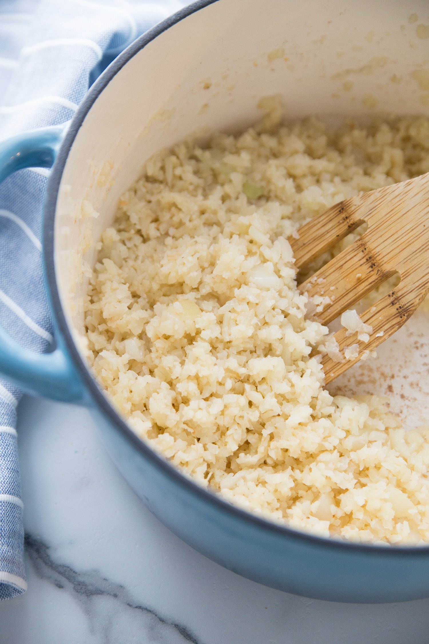 cooking riced cauliflower in a dutch oven