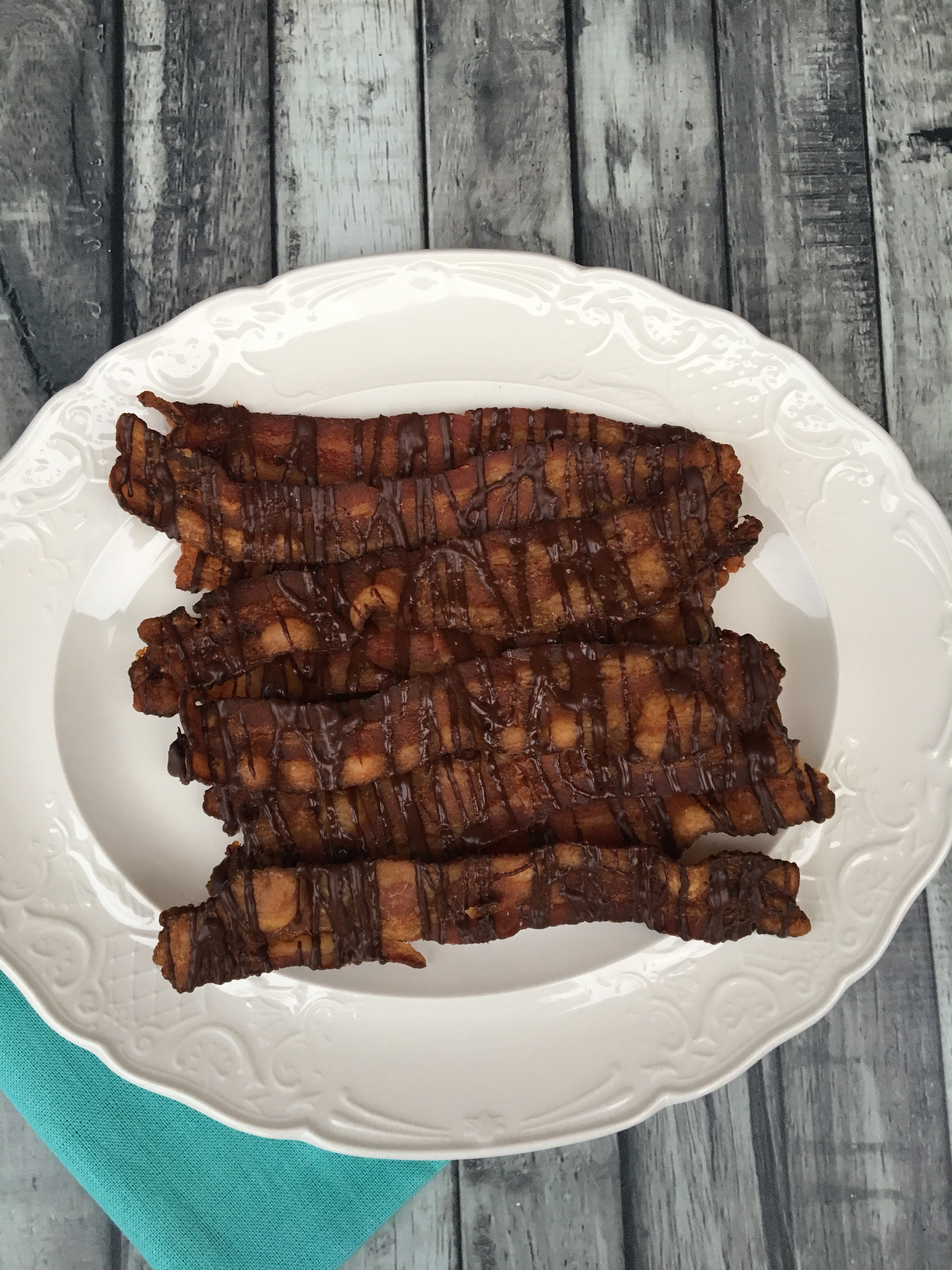 Chocolate Covered Bacon is the Keto Friendly recipe that you didn't know you needed in your life until now.  Bacon and chocolate are perfect for cravings! An ideal keto diet snack or low carb appetizer that everyone will love. A bacon lovers recipe for sure!