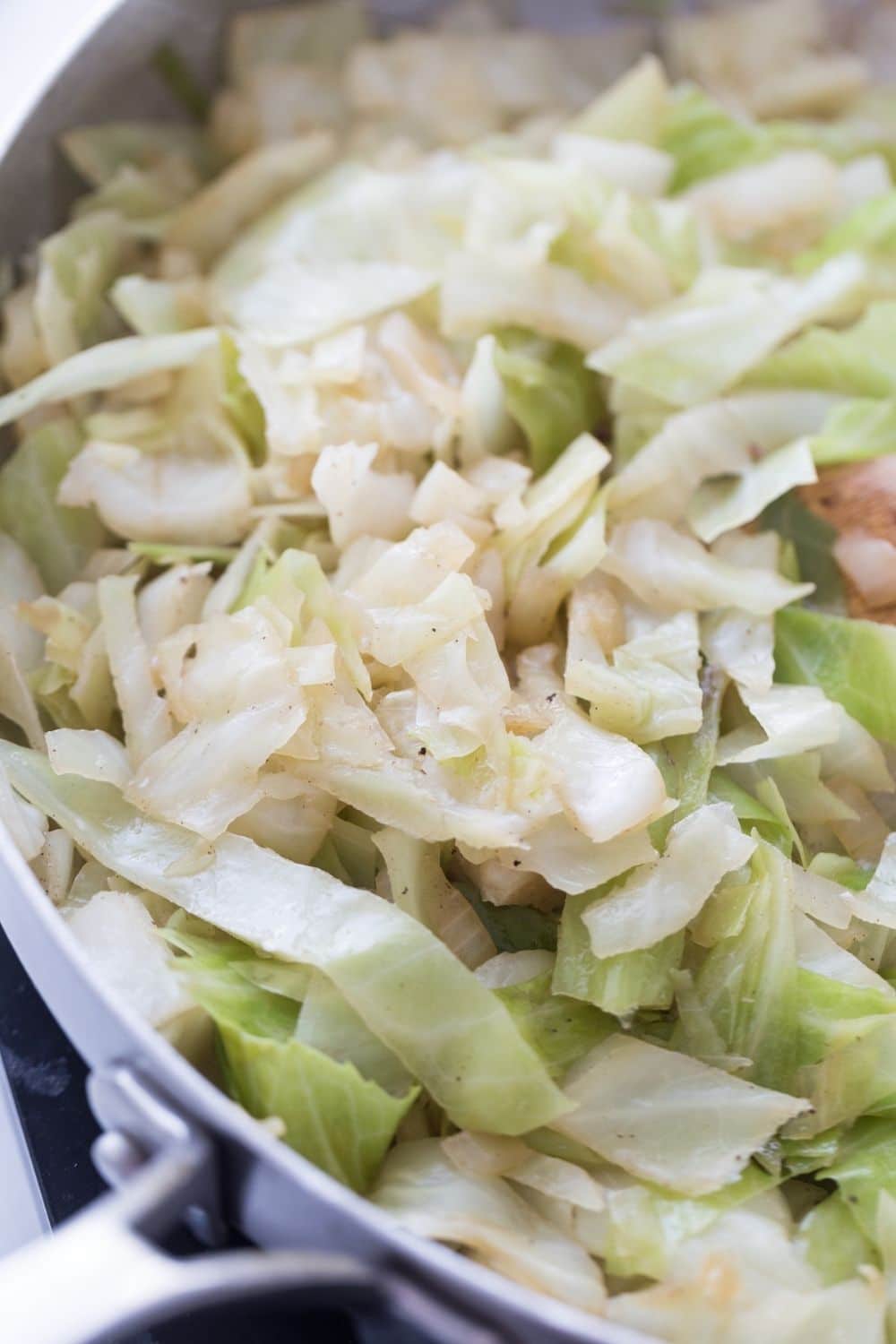 fried cabbage in a skillet