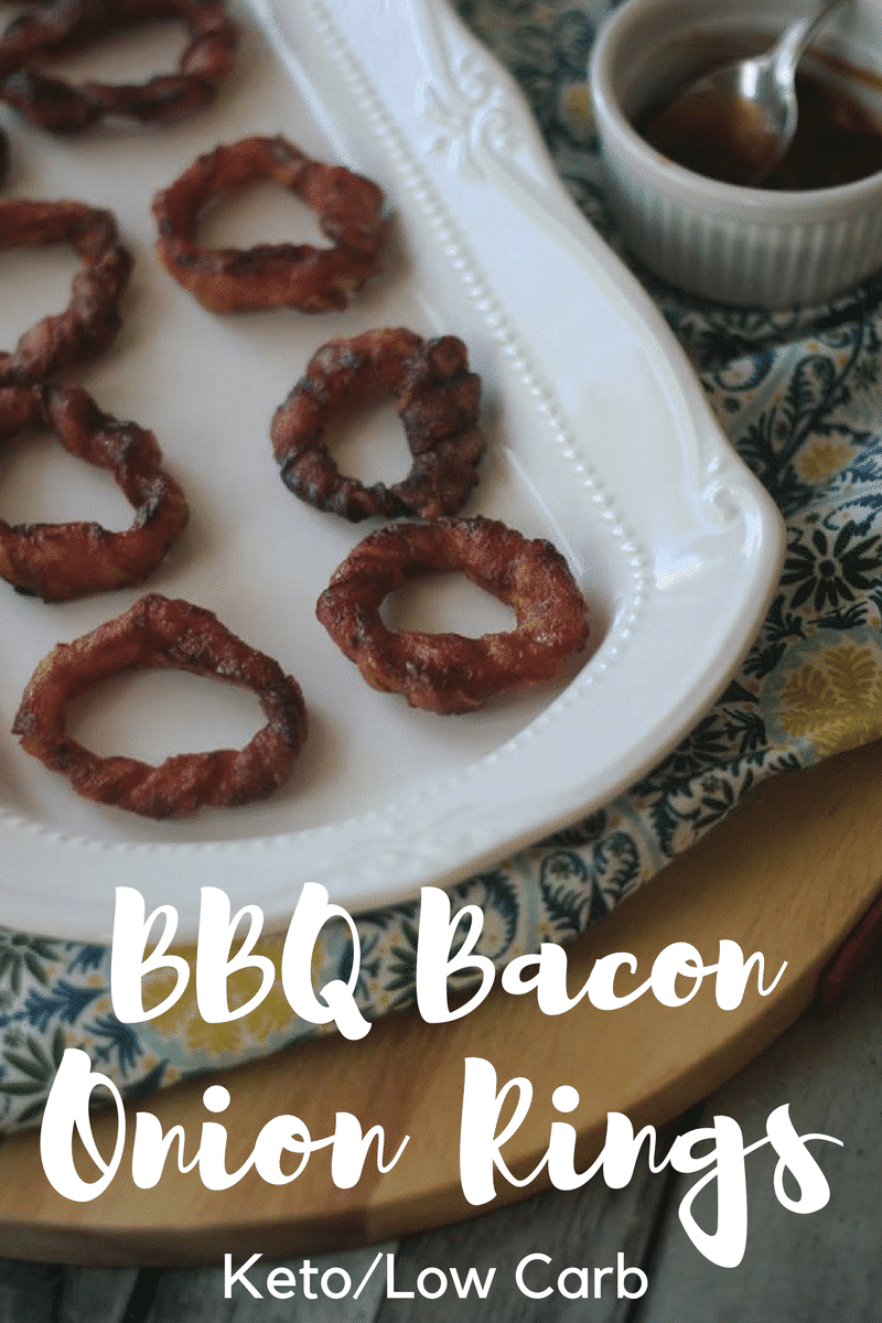 Keto Bacon wrapped Onion Rings on a white dish 
