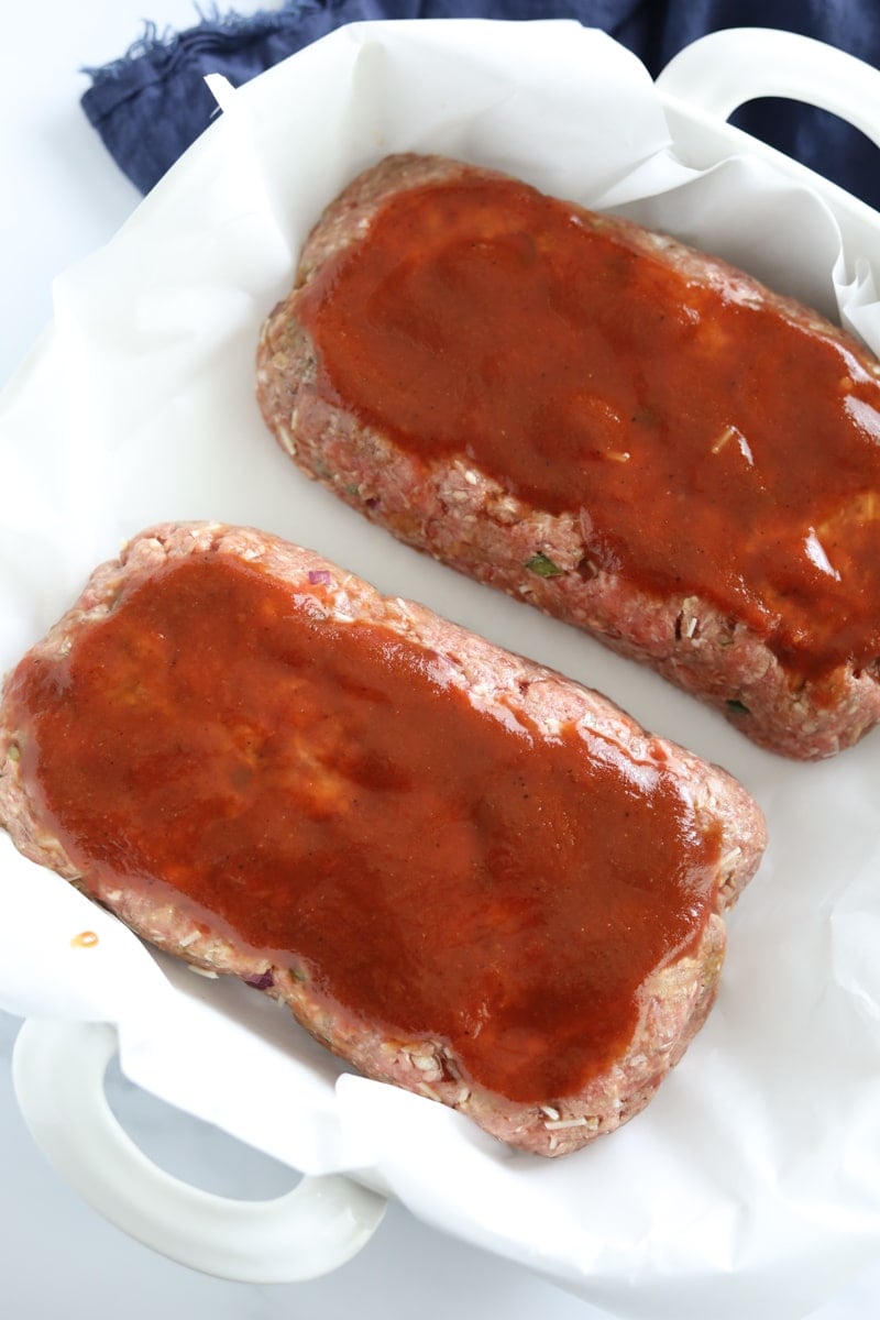 meatloaf with keto bbq sauce on top before baking