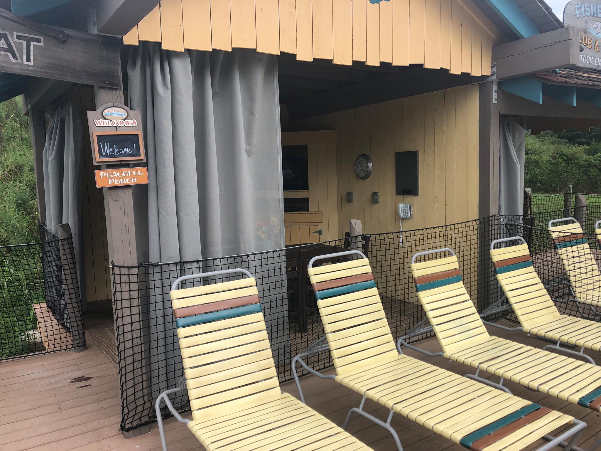 pool chairs outside cabana 