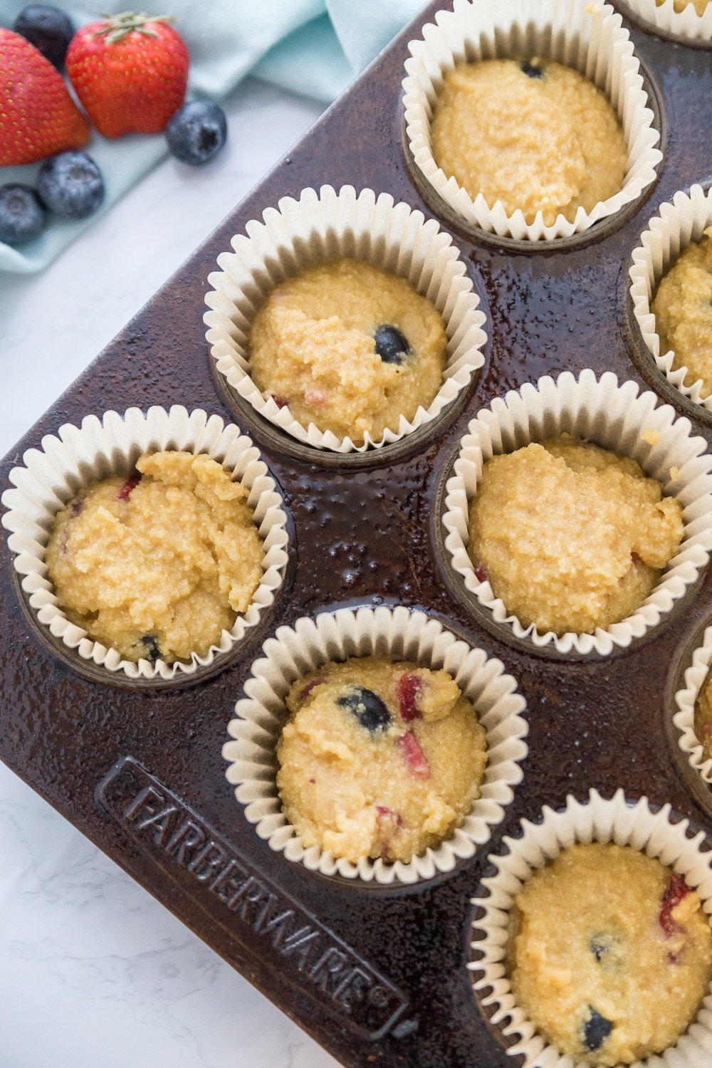 unbaked keto muffins in baking tin