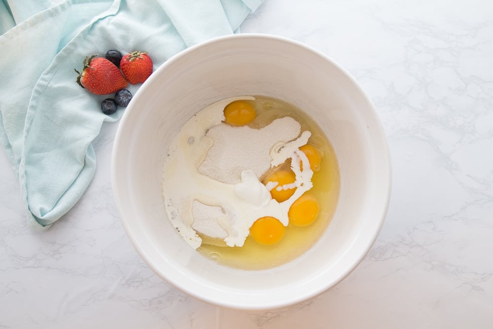 eggs and cream in a mixing bowl