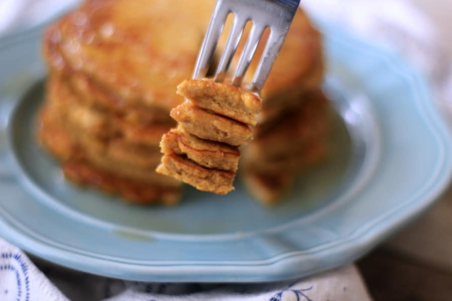 low carb pancake plated with a bite on a fork