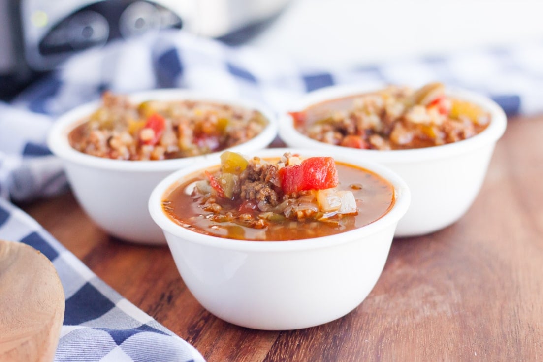 3 bowls of keto stuffed pepper crock-pot soup recipe placed in a triangle.