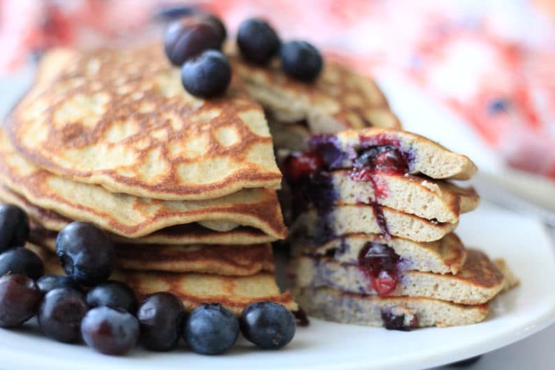 The very best Keto Blueberry Coconut Flour Pancakes are light, fluffy, and delicious! You'll love having this option as a change of pace and if you are already following a keto or low carb lifestyle then you most likely already have all the ingredients in your pantry. #keto #lowcarb