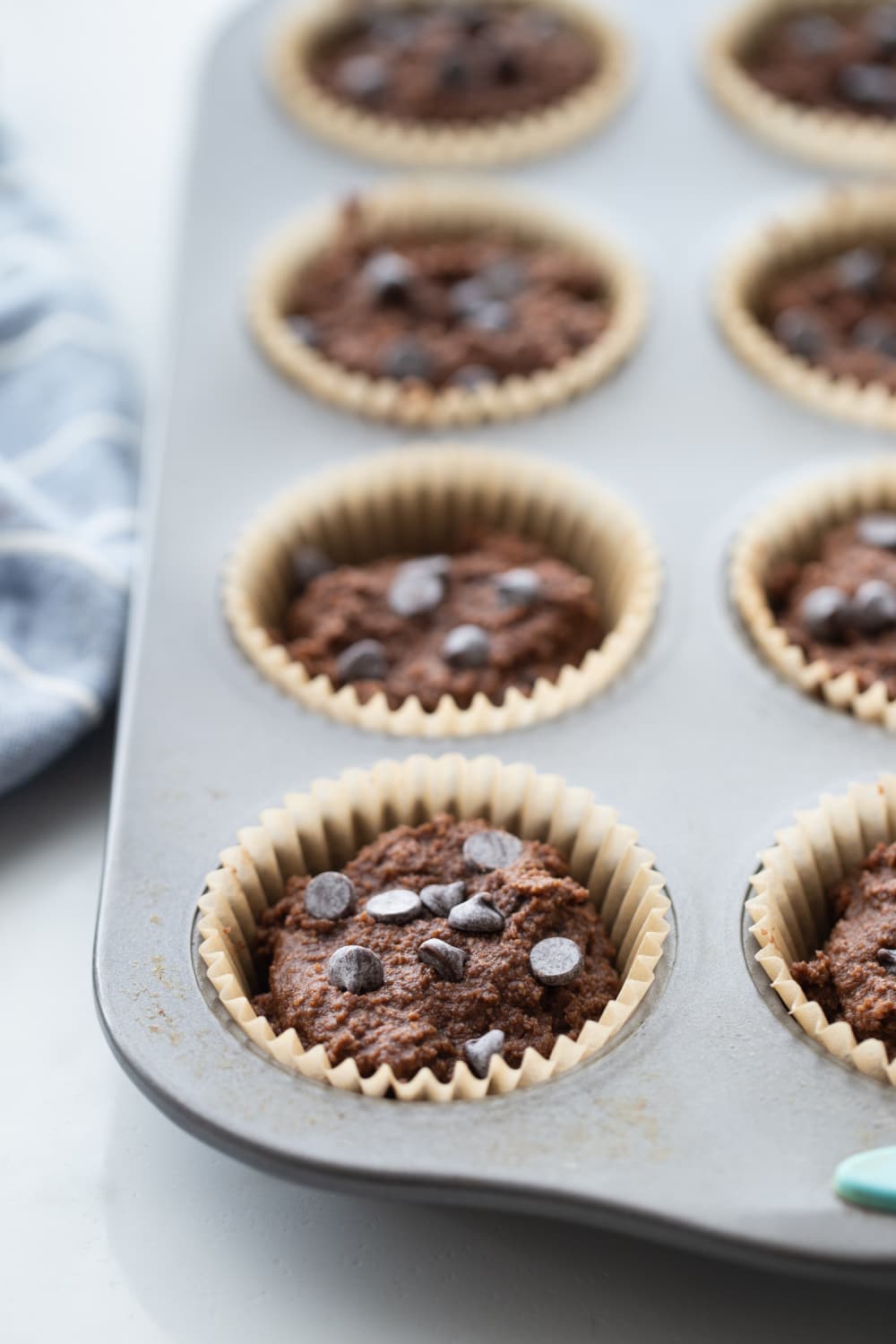 keto double chocolate muffins in a muffin pan