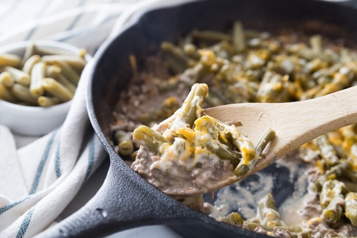 Mouthwatering shot looking down at the bubbling quick keto ground beef skillet casserole fresh from the oven, loaded with velvety cream sauce and melted cheese.