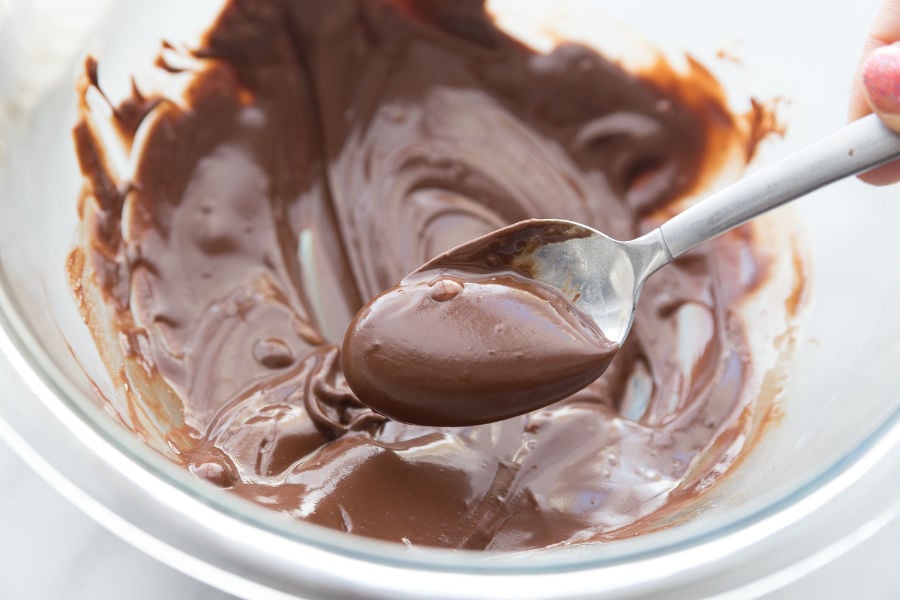 keto chocolate, low carb chocolate, sugar-free chocolate melted in a bowl for the chocolate layer
