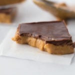 A picture of No Bake Peanut Butter Chocolate Bars on a napkin