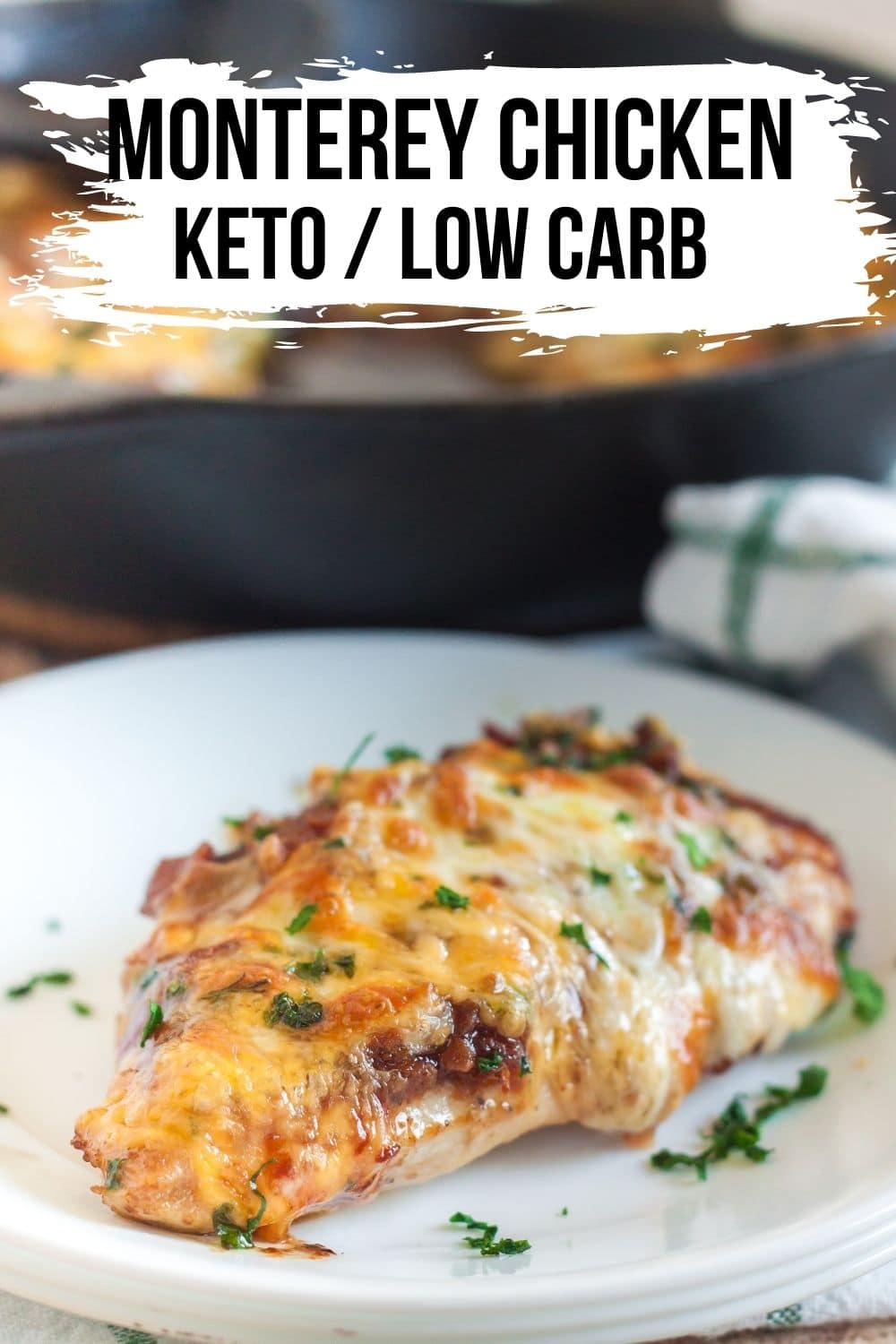 keto monterey chicken with cheese and bacon plated with parsley 