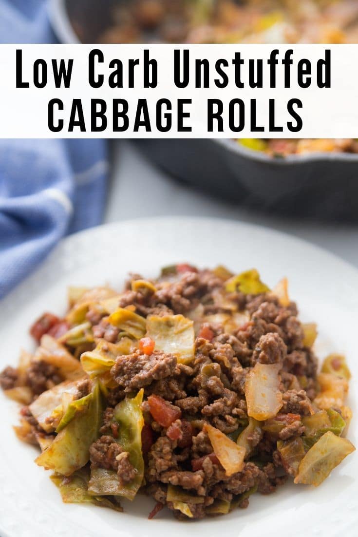 white plate of low carb unstuffed cabbage rolls with a skillet in the back of the photo