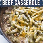 cast iron skillet with Ooey gooey keto ground beef casserole topped with melted cheese fresh from the oven,