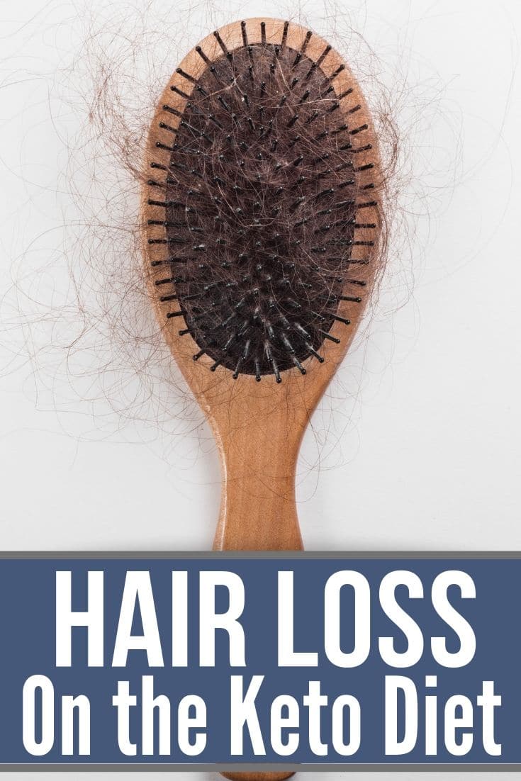brush with a bunch of hair in it from hair loss on keto