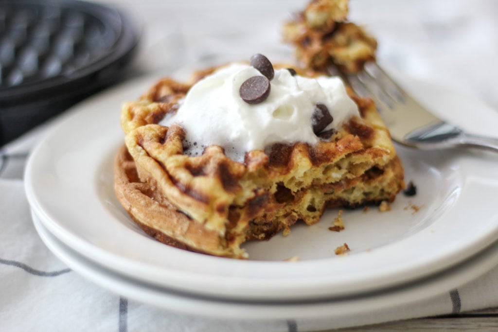chocolate chip chaffle keto recipe plated with waffle maker in background