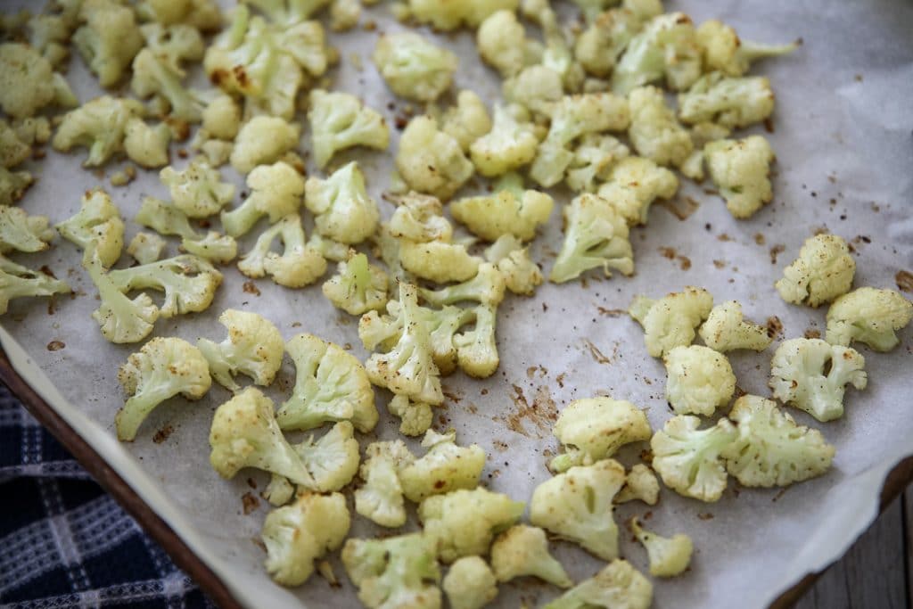 roasted cauliflower on parchment paper
