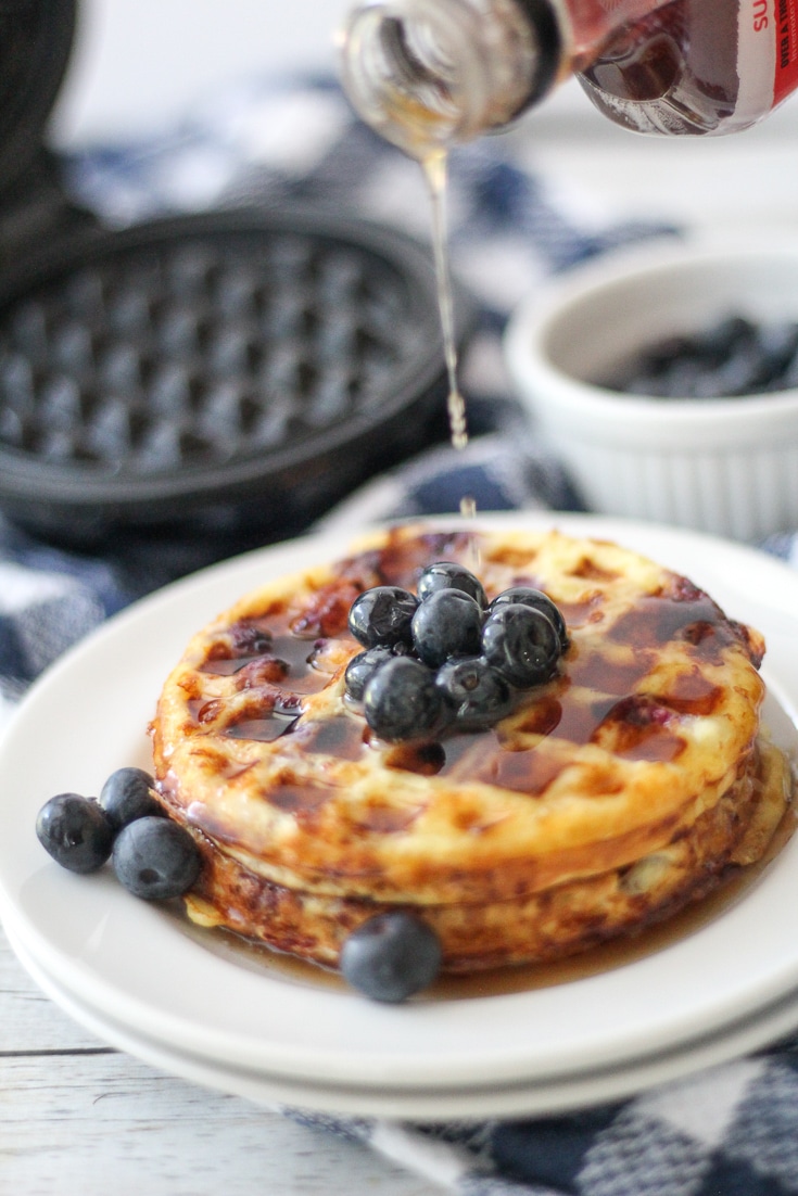blueberry Keto Chaffle recipe plated with maple syrup on top