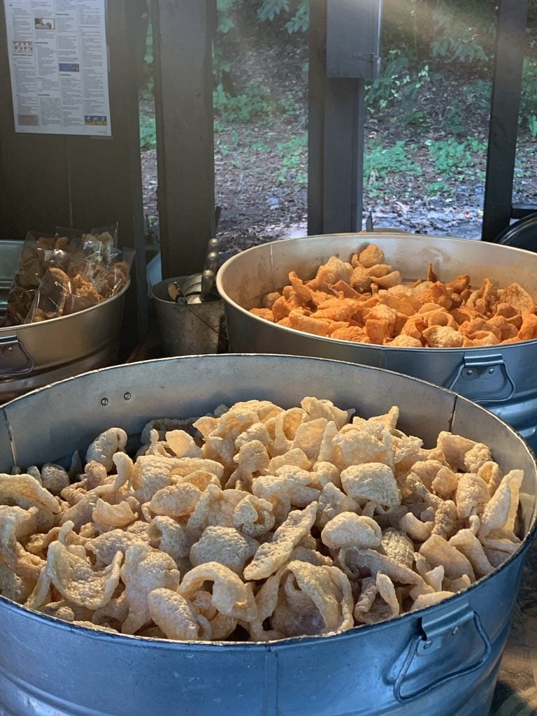 pork rinds in big stainless steel tubs - original and bbq low carb foods at Dollywood theme park