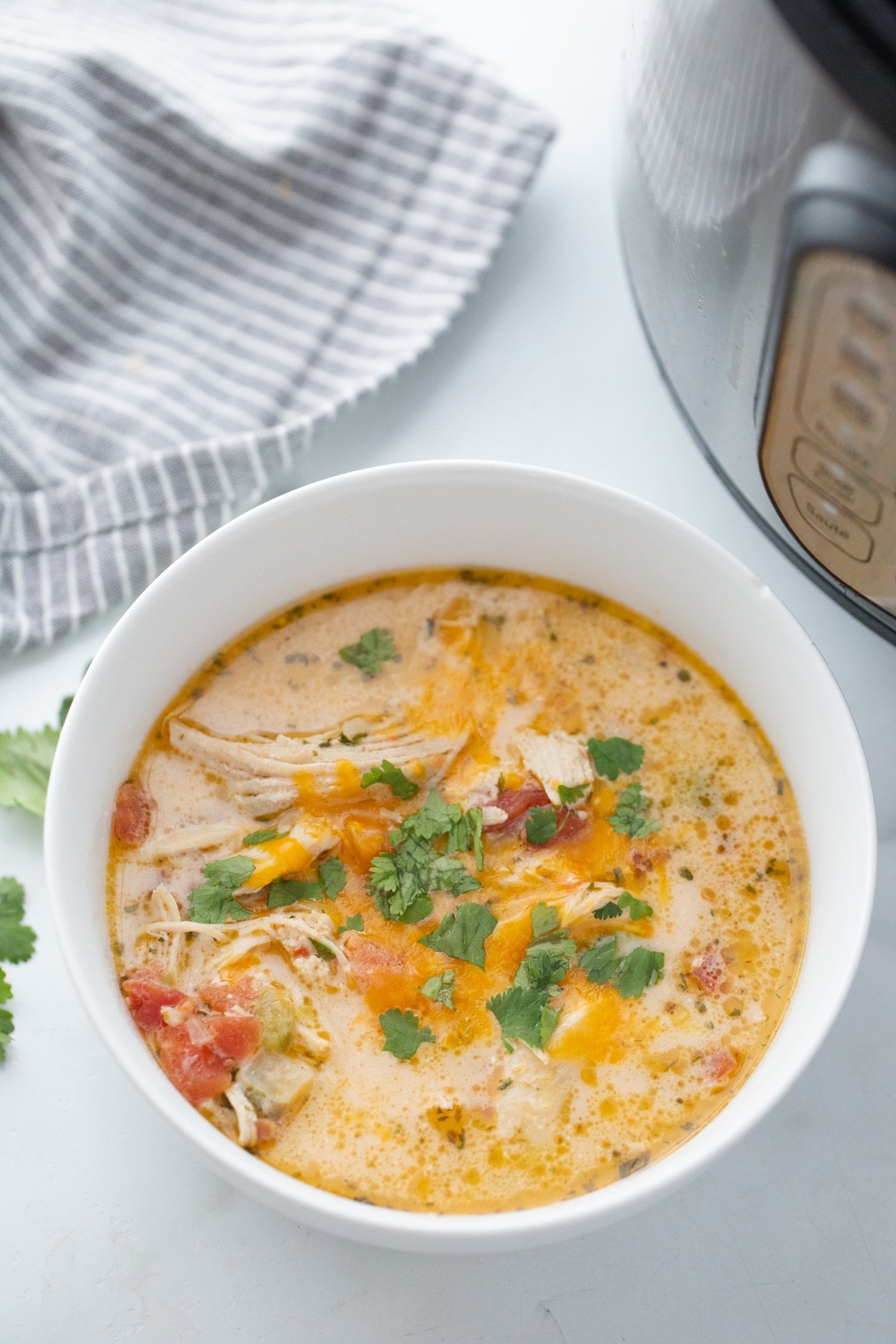 low carb taco chicken soup in a white bowl