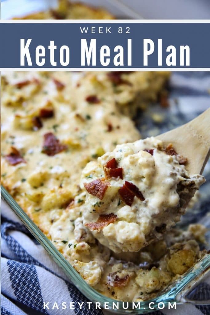 Keto Cauliflower Casserole with hamburger meat in a clear dish with wooden spoon 