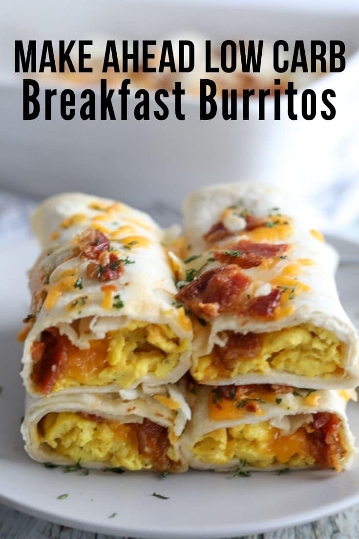 Four stacked burritos with eggs, bacon and cheese.