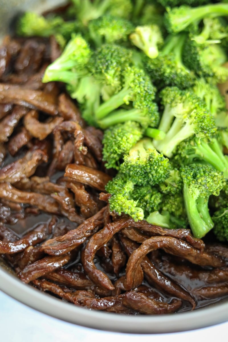 broccoli and sliced flank steak in sauce