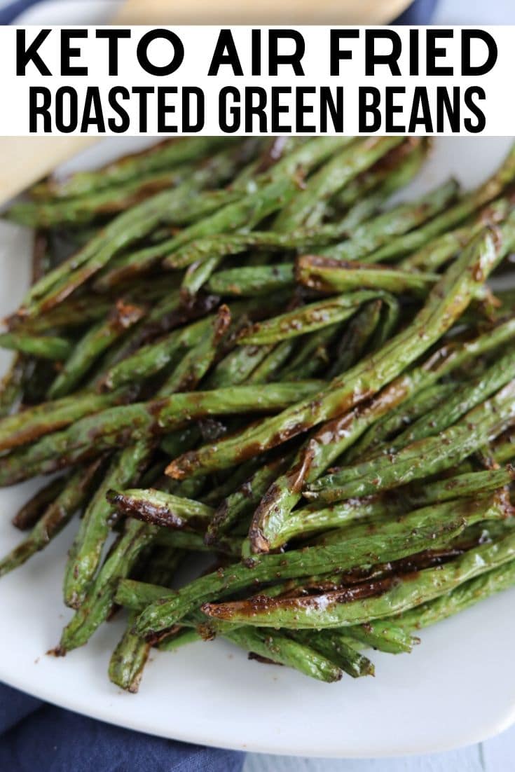 A picture of Keto Air Fried Roasted Green Beans on a white dish 