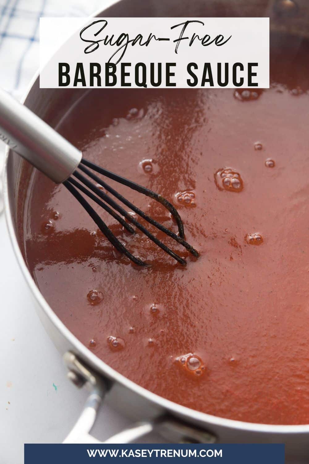 sugar free bbq sauce in a pot with a whisk