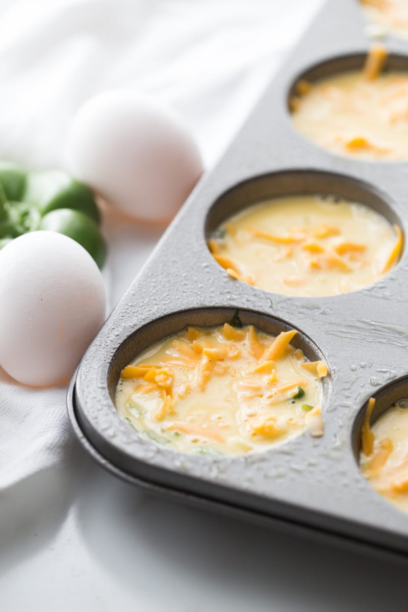 cheese and eggs in muffin tin