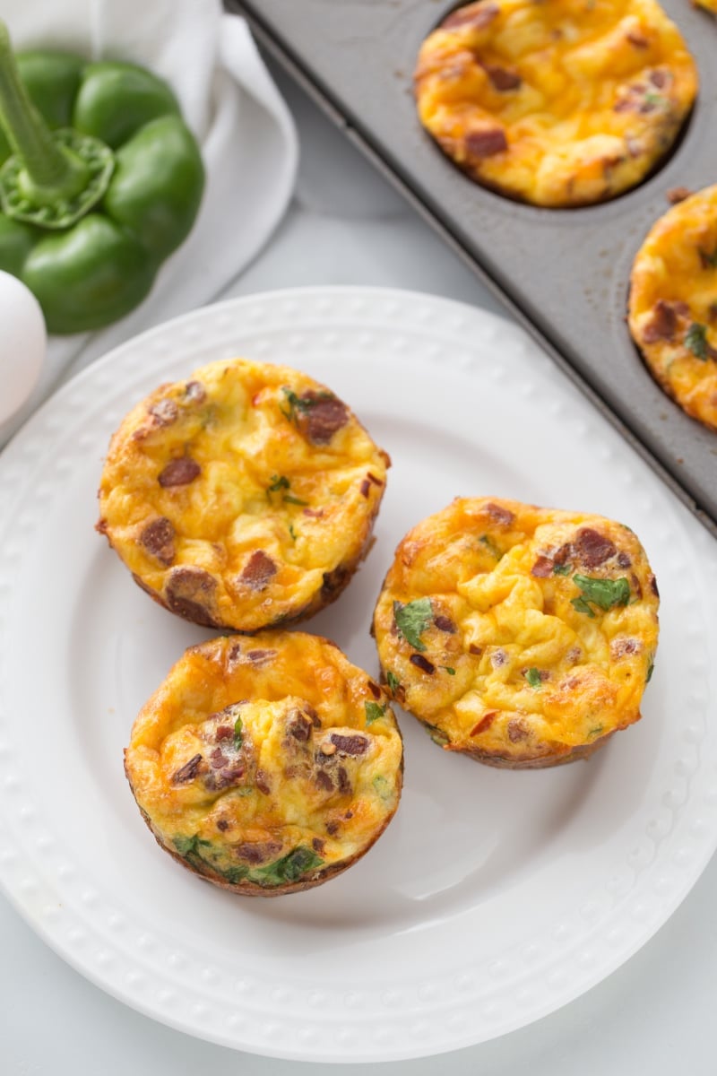 three egg muffins on a white plate