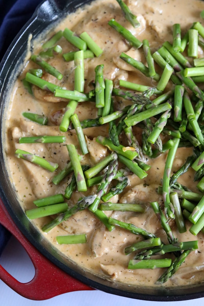 add chopped asparagus to the cream sauce