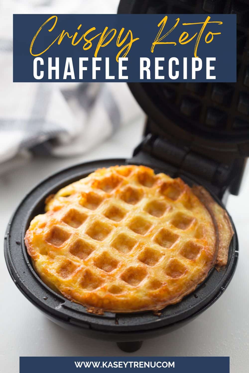 keto chaffle in dash waffle maker with lid open