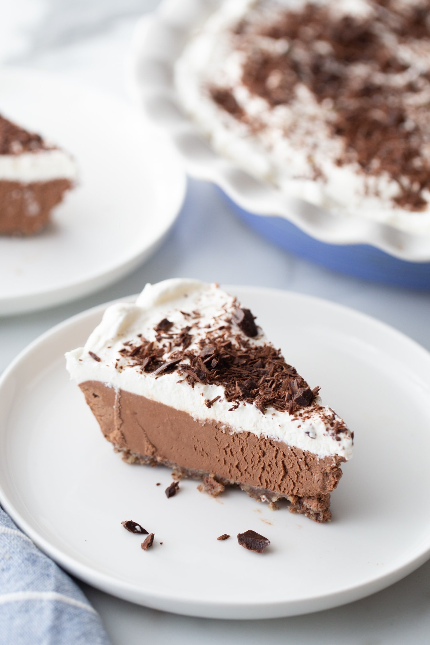 slice of keto chocolate mousse pie on a white plate