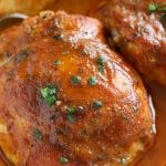 low carb chicken thighs covered in BBQ sauce