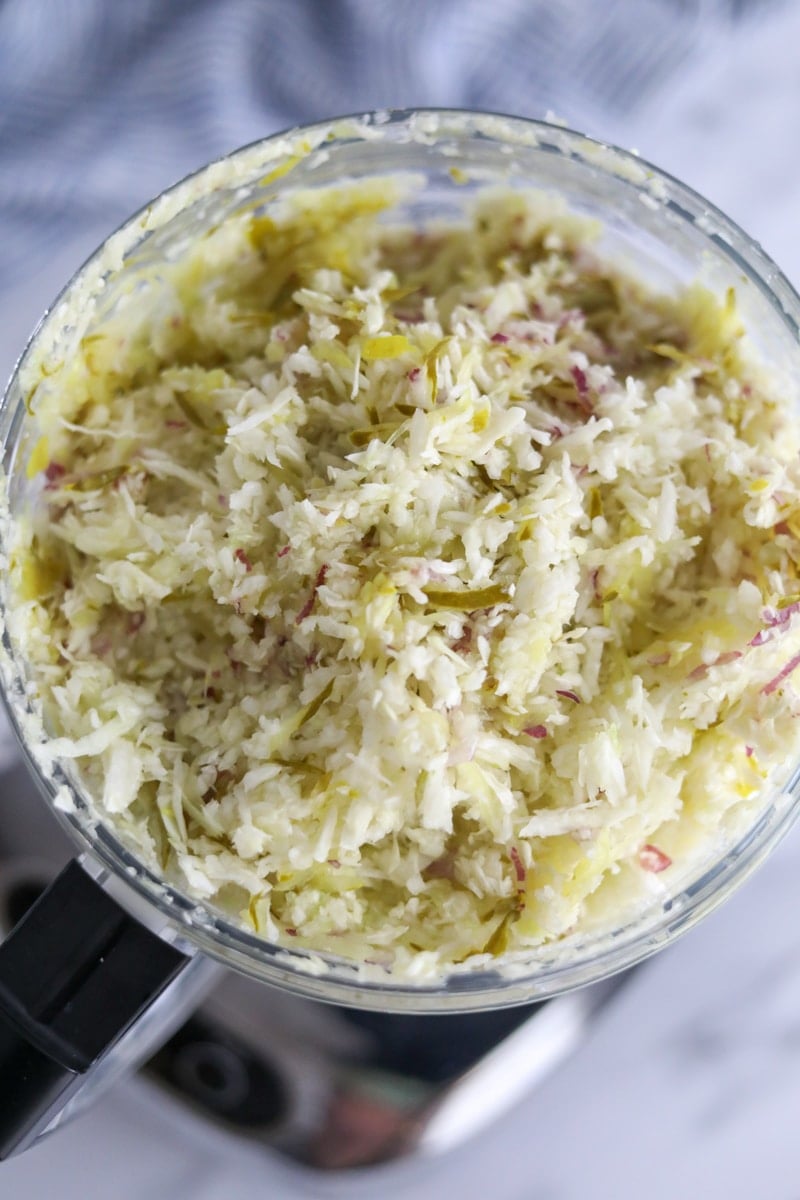 shredded cabbage in a clear bowl