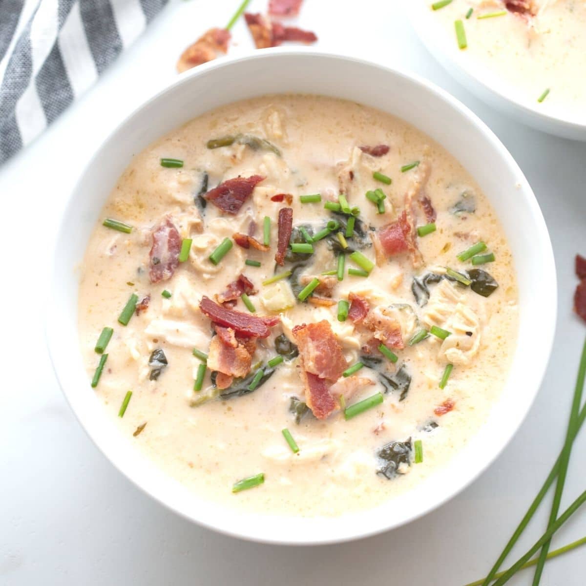 chicken crack soup in a bowl with crumbled bacon over top