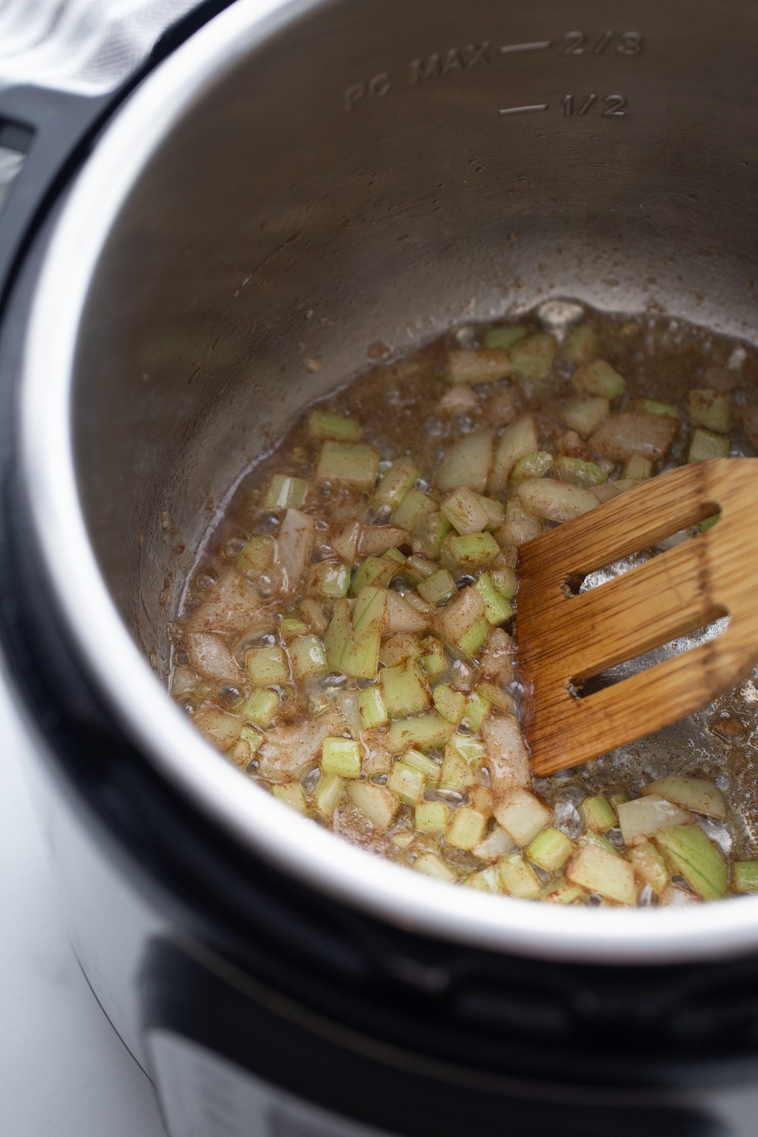 onions and garlic sauteing in the instant pot 