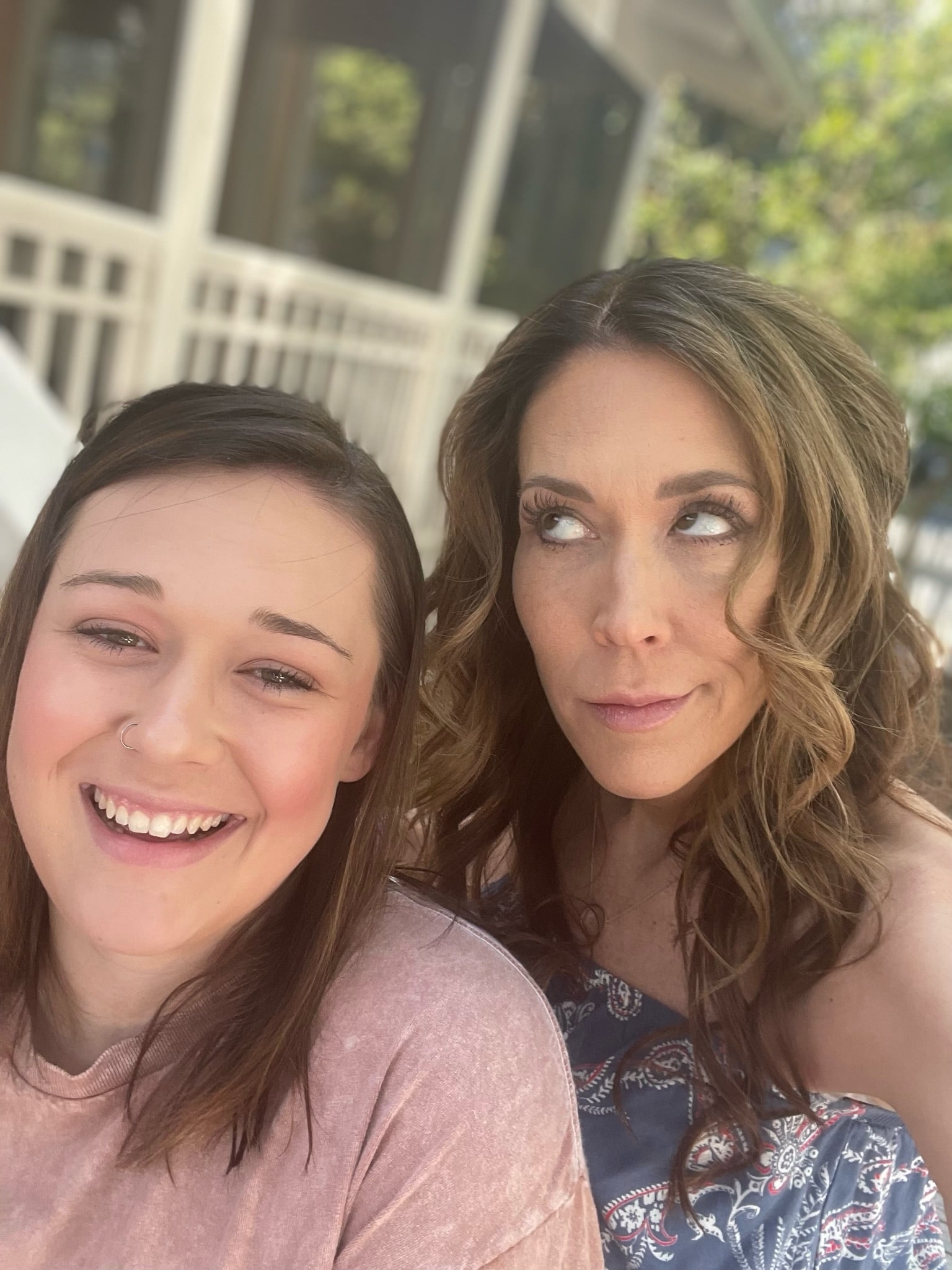 mom making a silly face with daughter