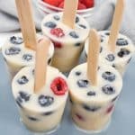 top view of keto popsicles with blueberries and raspberries