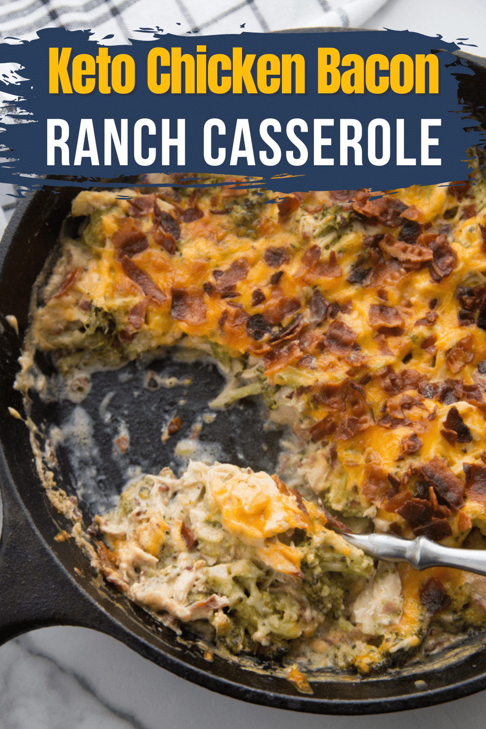 cast iron skillet with a spoon in it and text overlay with words chicken bacon ranch casserole 