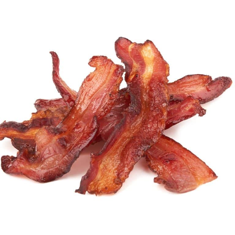 featured image of a close up shot of cooked bacon on a white background