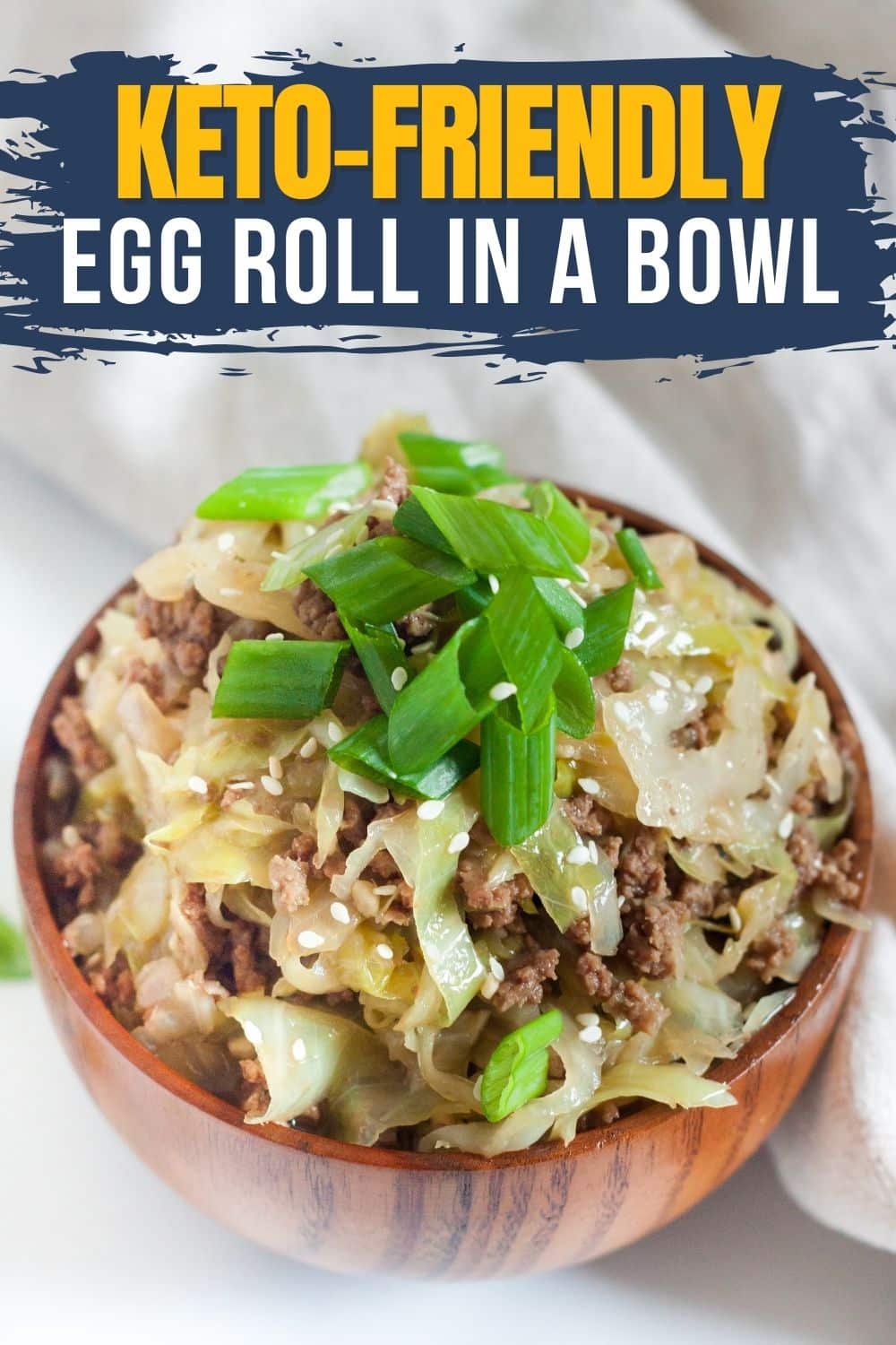 image with keto egg roll in a bowl and yellow and white wording across a blue banner