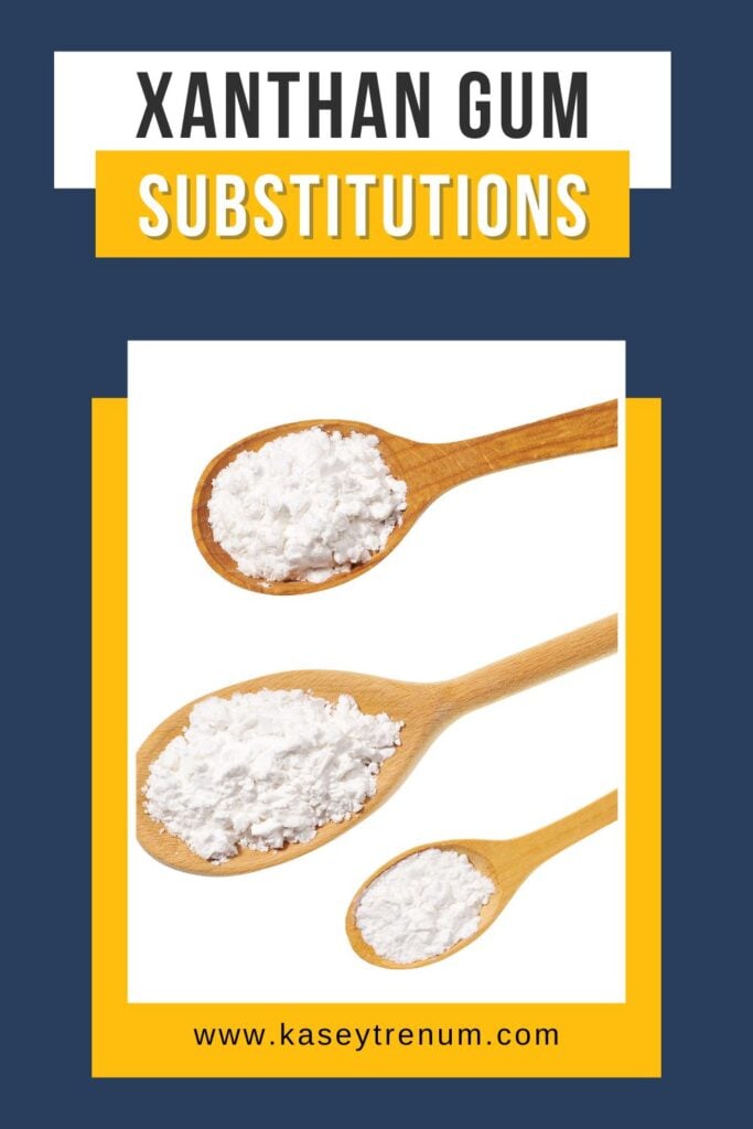Three wooden spoons filled with xanthan gum substitutes, including cornstarch, chia seeds, and ground flaxseeds, on a white background with a yellow and blue border containing the words 'XANTHAN GUM SUBSTITUTIONS'