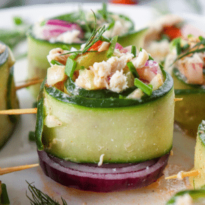 Buffalo Chicken Cucumber Rolls featured image, showcasing the finished appetizer rolls secured with toothpicks, perfect for a low-carb, keto-friendly snack or party dish.