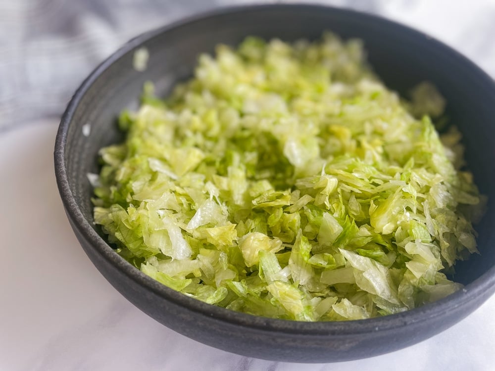 Large Mixing Bowl with Fresh Lettuce for Keto Italian Grinder Salad